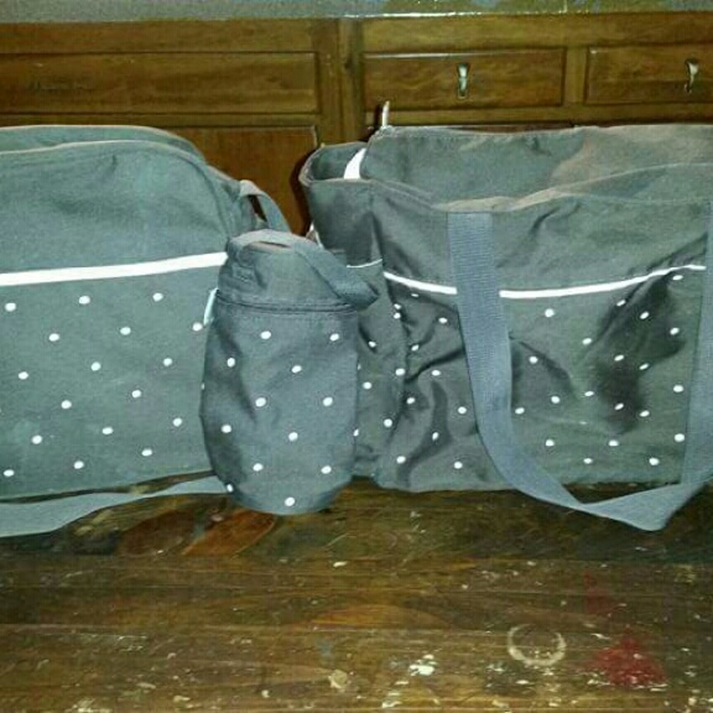 Diaper bags with bottle holder
