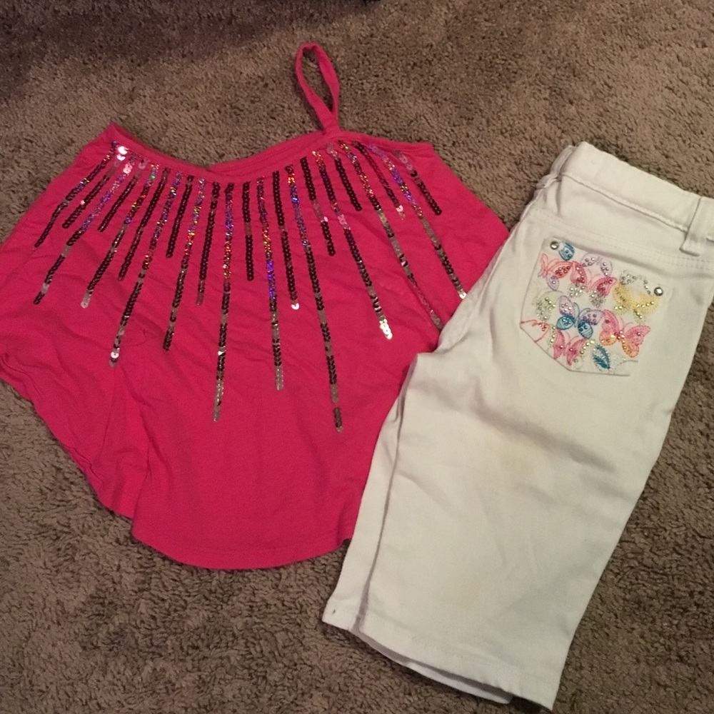 Pink sequin top and white long shorts
