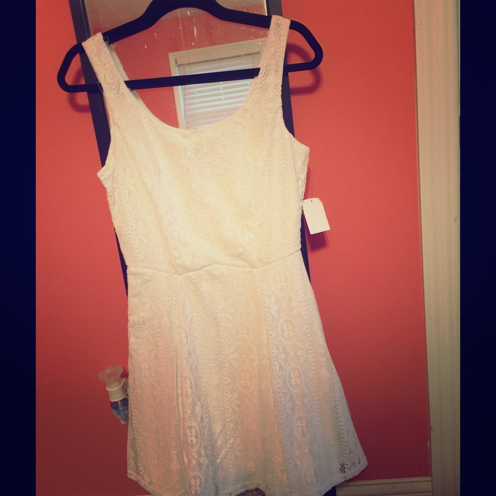 Pleated white lace dress