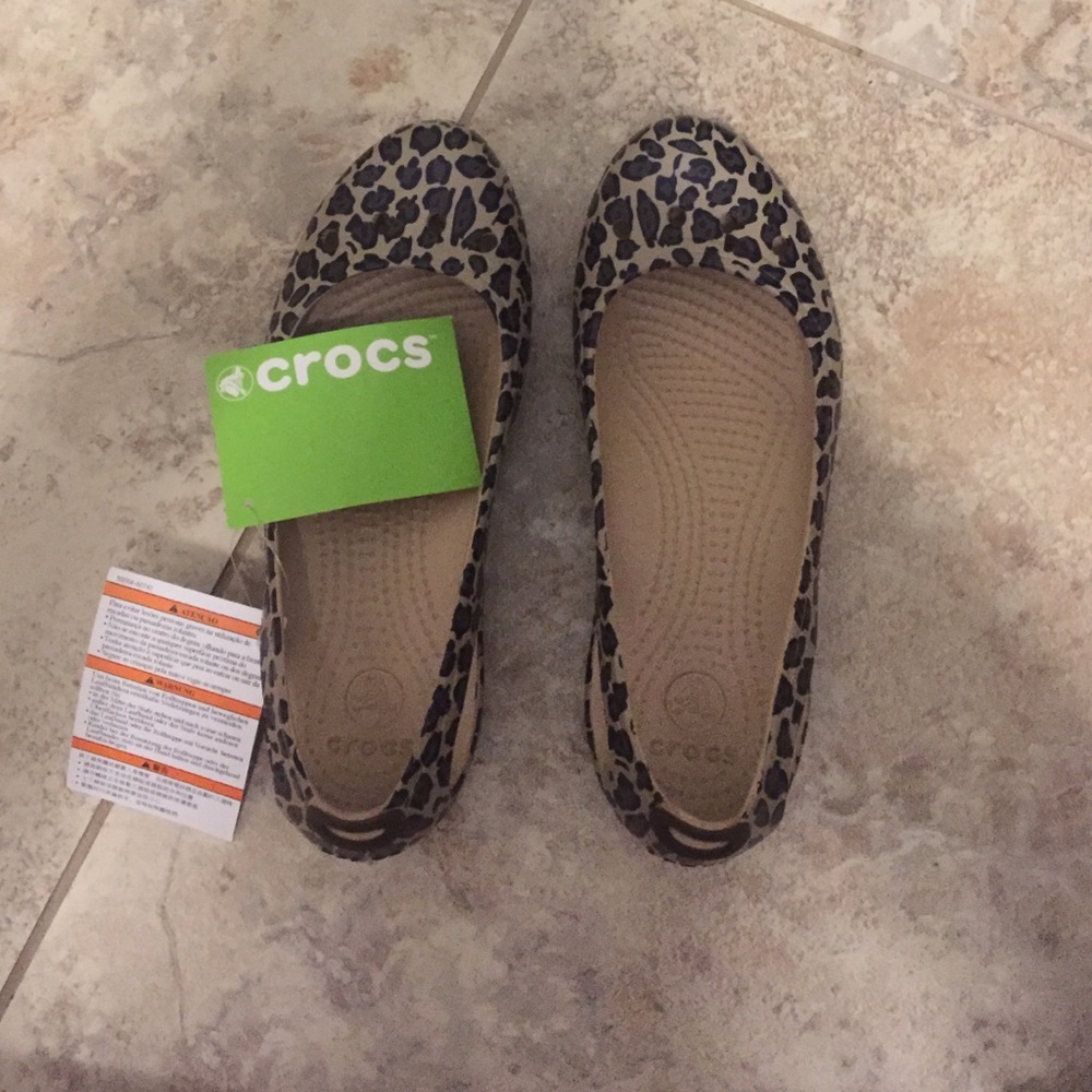 NEW NEVER WORN Leopard crocs