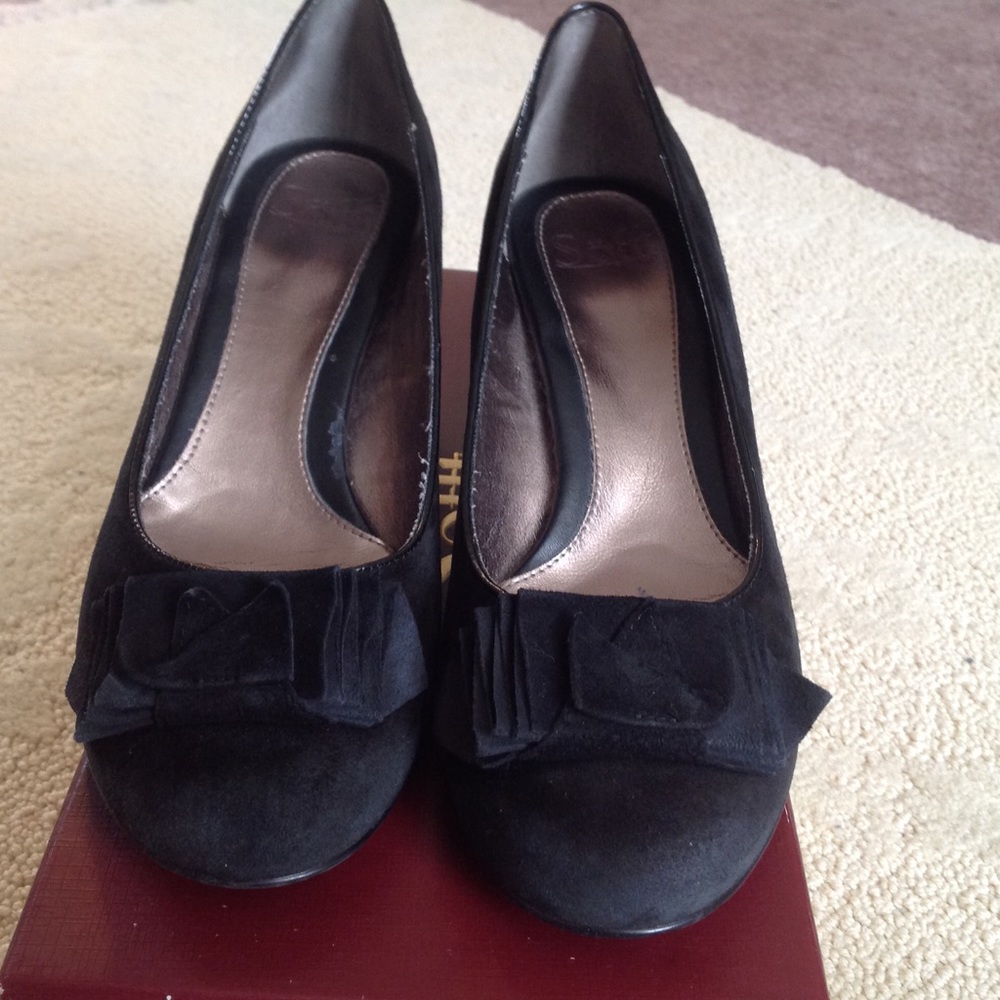 Black suede pumps