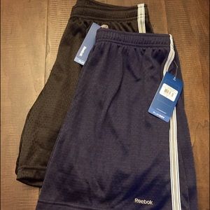 Two Men's Reebok Athletic Shorts Size Medium