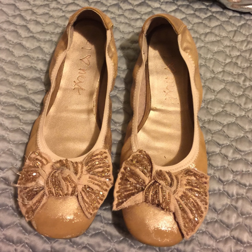 Distressed metallic ballet flats