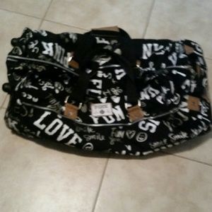 Victoria Secret (PINK) rolling suitcase