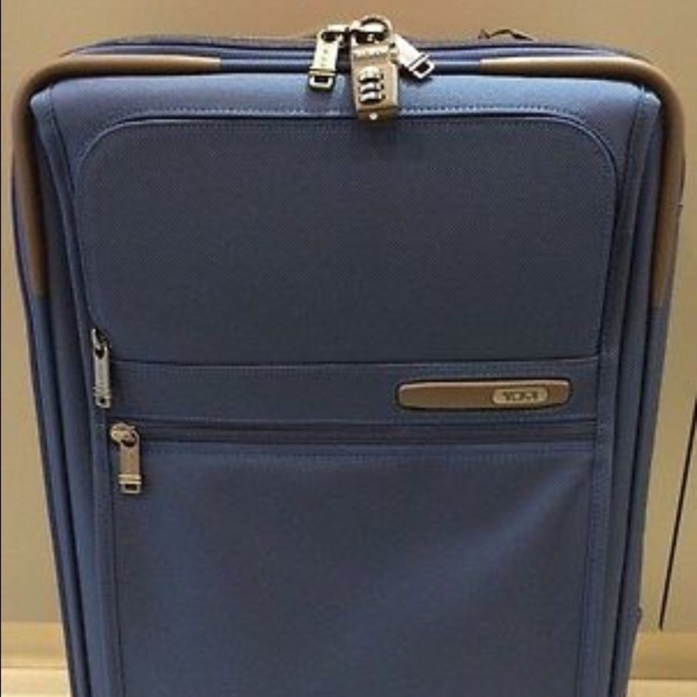 Tumi expandable carry on roller luggage
