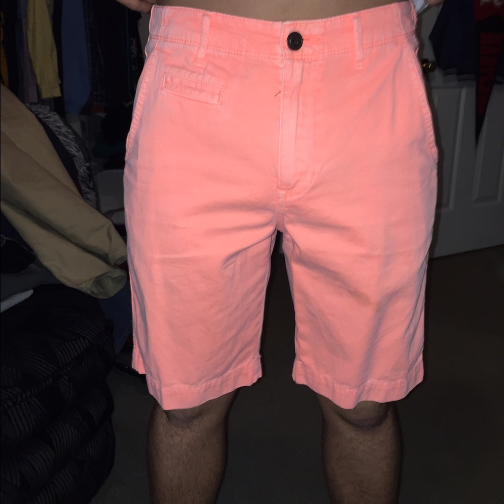 Men's pink khaki shorts.