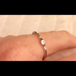 Silver tone ring with tiny stone