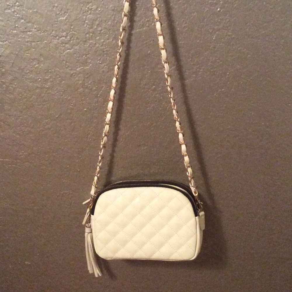 White purse gold detail