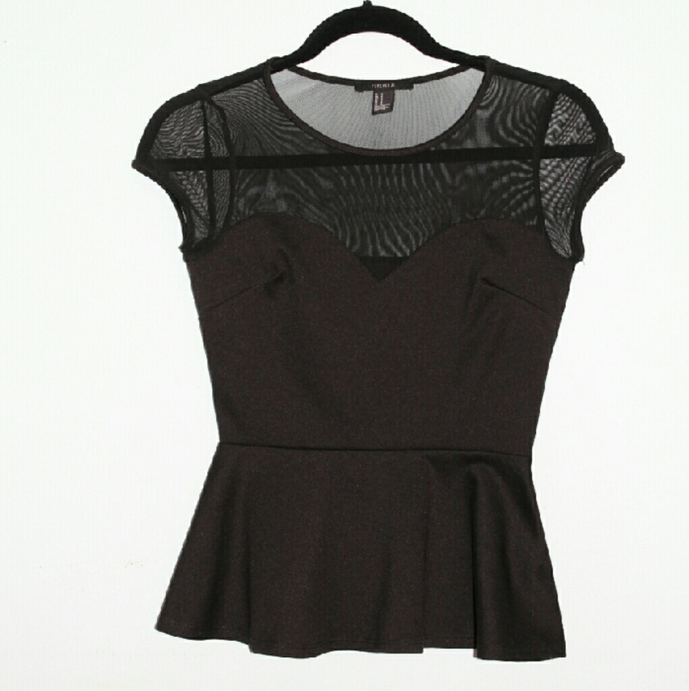 Black Peplum Blouse With Illusion Fabric.