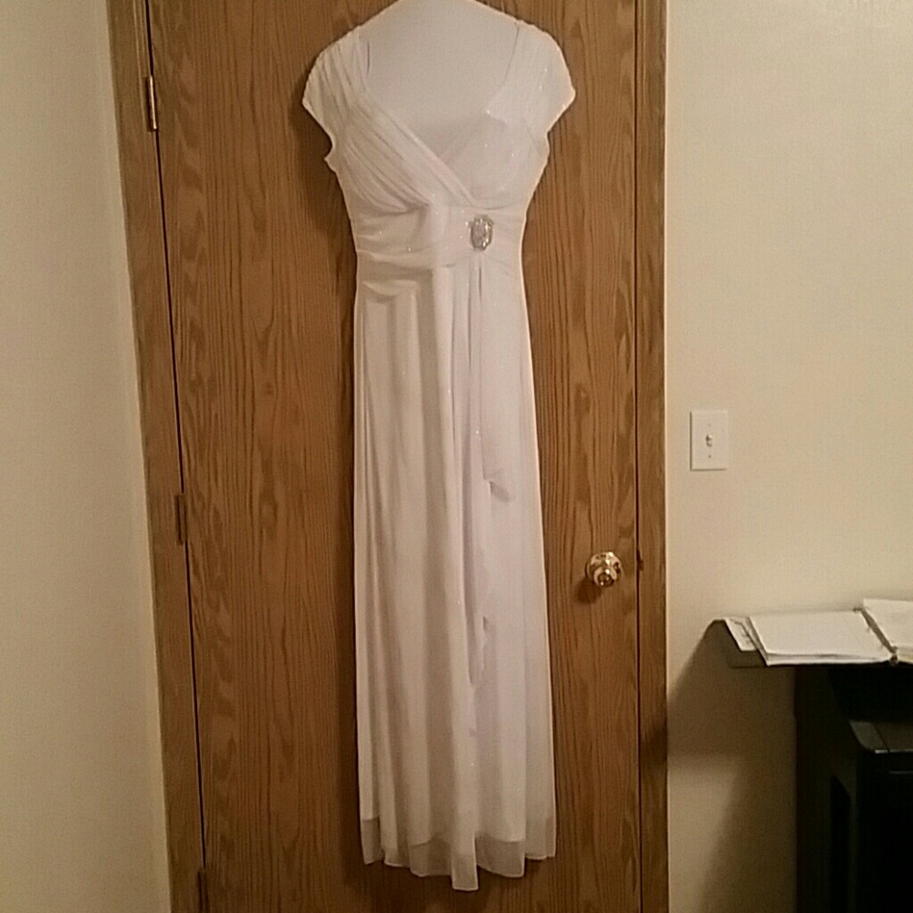 Full length white formal gown with gold sparkles