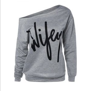 "Wifey" Gray off one shoulder sweatshirt.