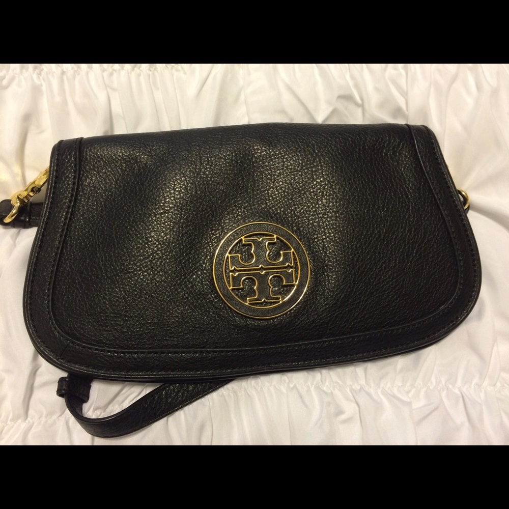 Tory burch black clutch.