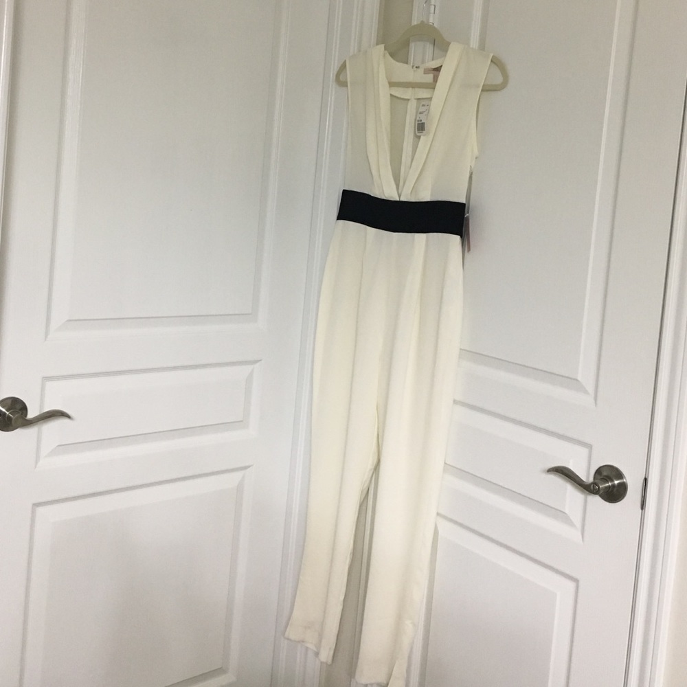 Cream/black jumpsuit/cap slv