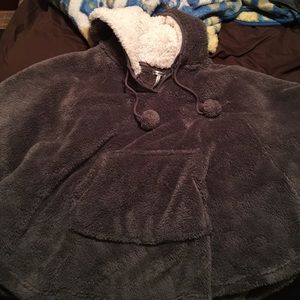 Polyester grey poncho with hoodie.