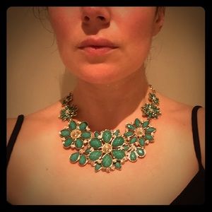 Amrita Singh turquoise floral necklace.