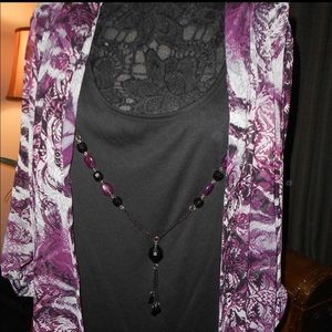 5x top with attached tank and necklace.