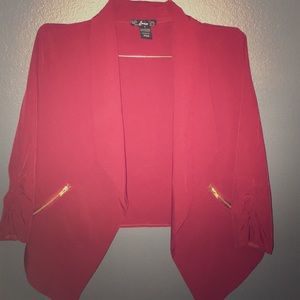 Stretchy deep red cover up! Looks brighter in pic