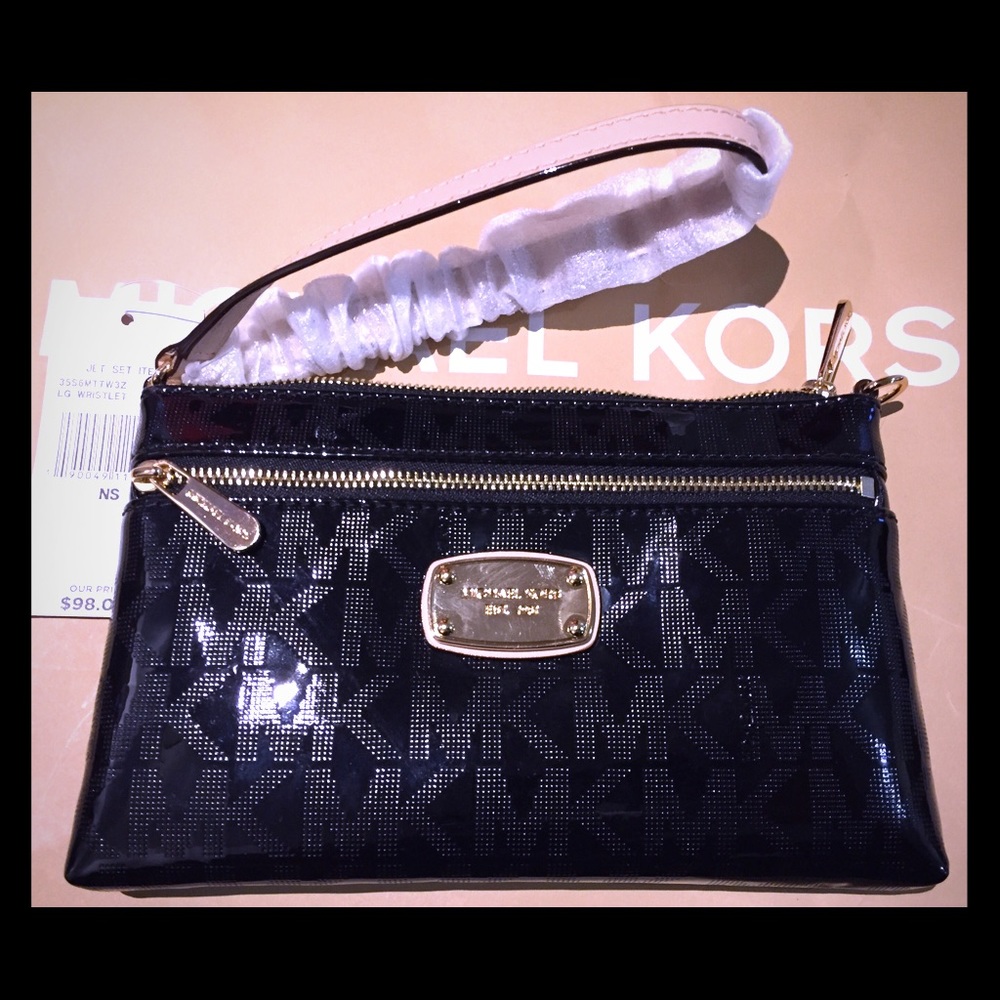 MK Jet Set Signature wristlet