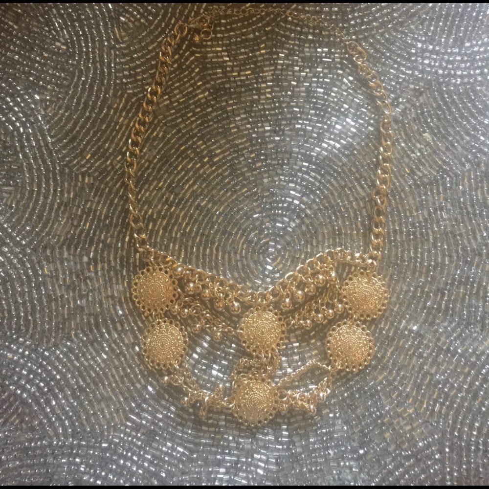 Gold costume choker necklace.
