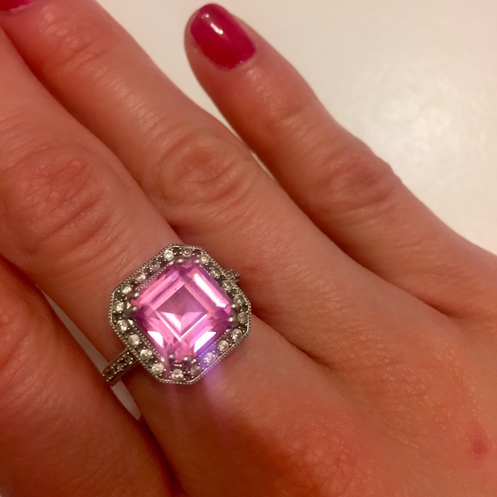Pink sapphire halo set ring