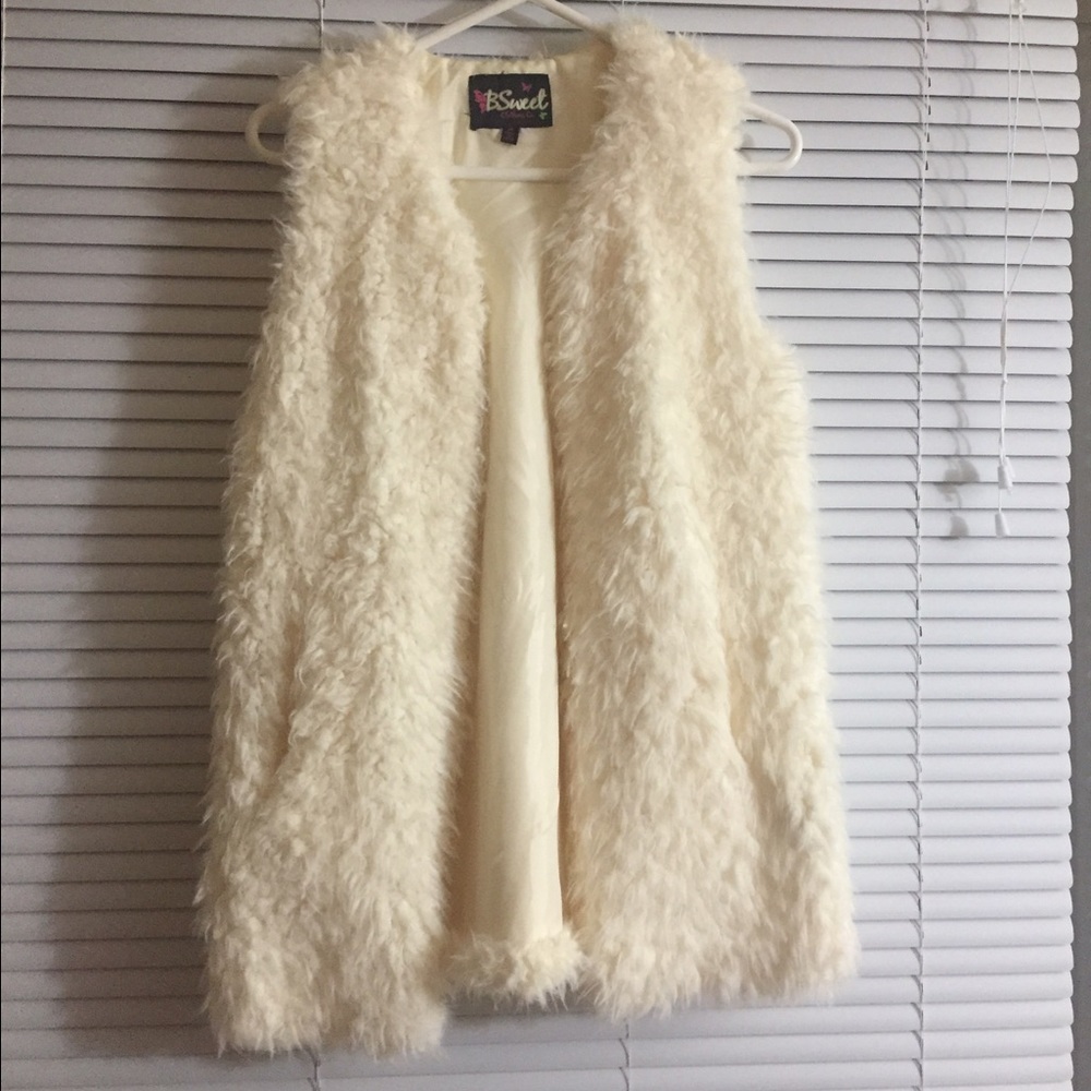 White faux fur vest