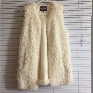 White faux fur vest