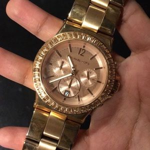 Gold rose MK watch/bracelet and earrings.