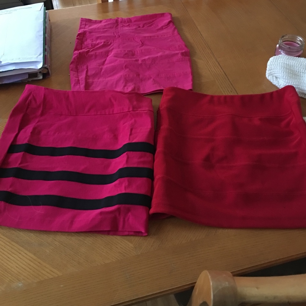 Three pencil skirts