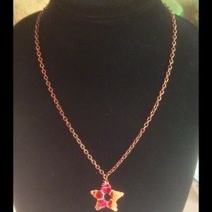 Necklace with wire wrapped star pendant