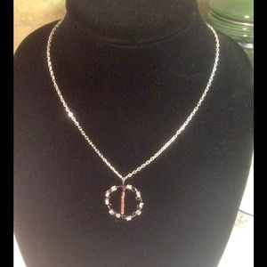 Necklace with looped beaded pendant