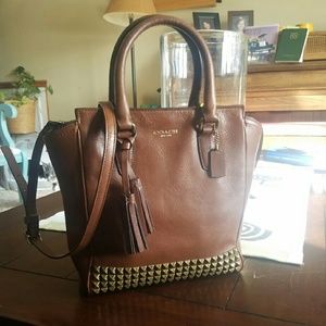 COACH Legacy studded mini tanner crossbody bag.