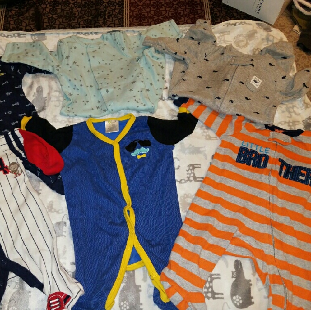 This is a bundle of baby boy sleepers...