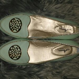 Mint and gold loafers