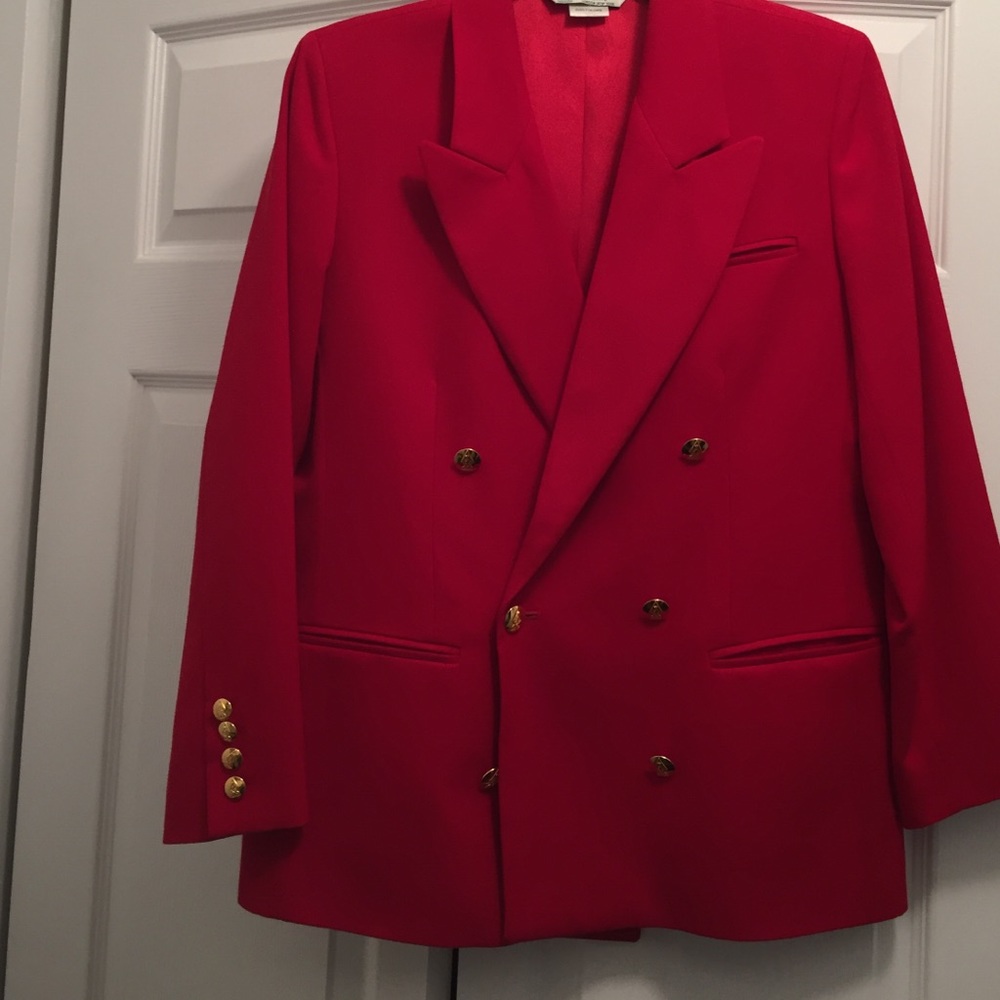 Red blazer with gold buttons.