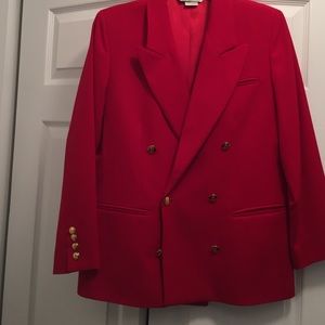 Red blazer with gold buttons.