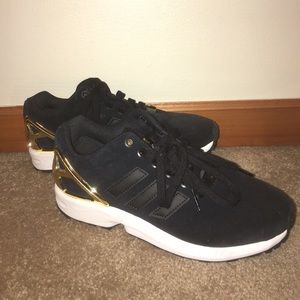 Adidas suede three stripe shoe in black