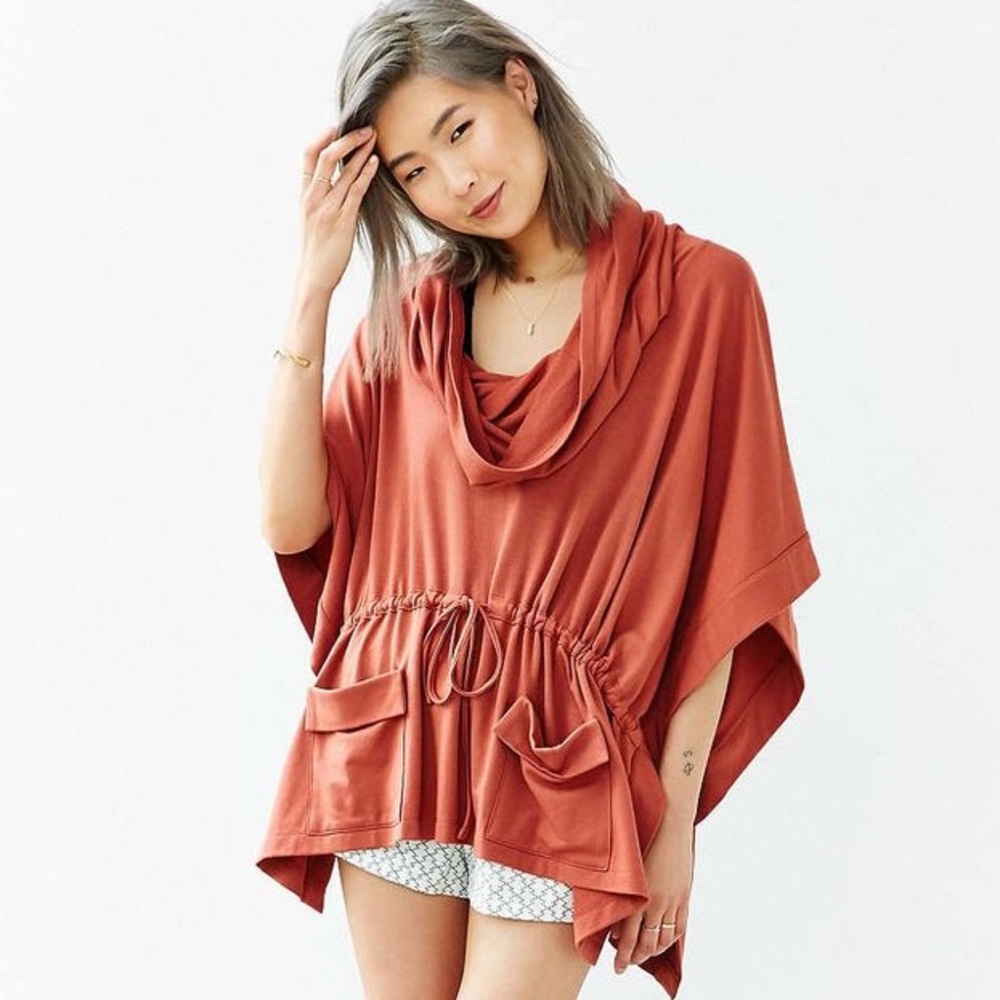 Urban Outfitters orange poncho