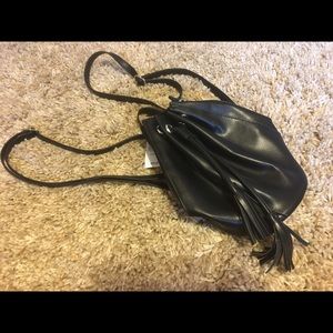 Black bucket bag/backpack. Mini