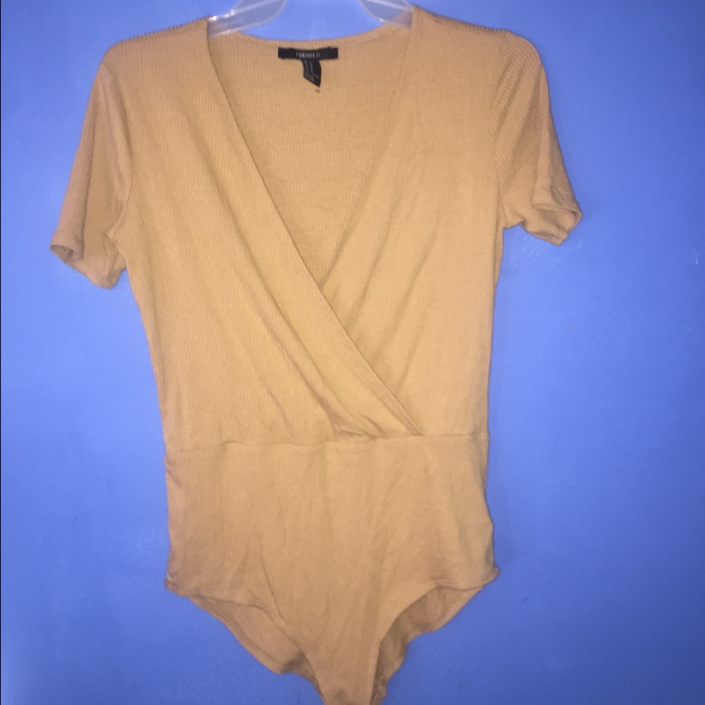 Forever21,Large tan v cut bodysuit