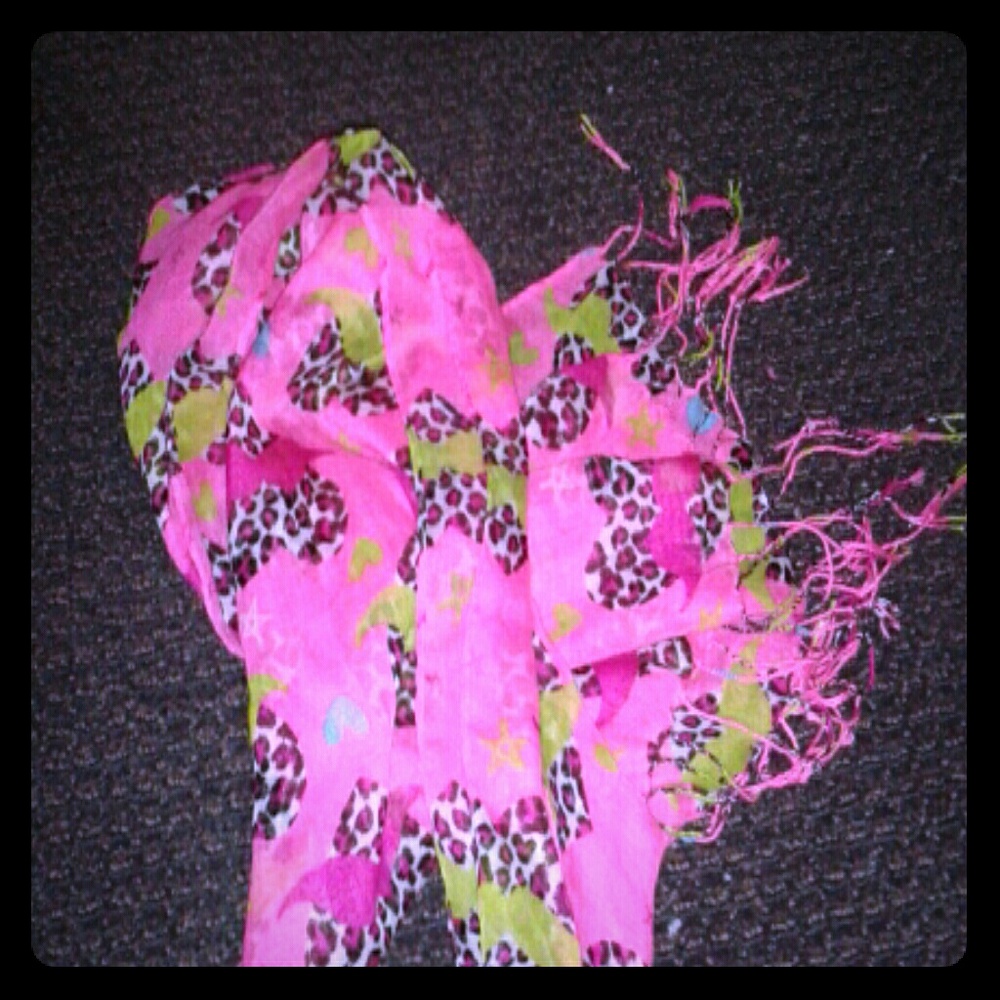 a pink scarf with zebra print and green