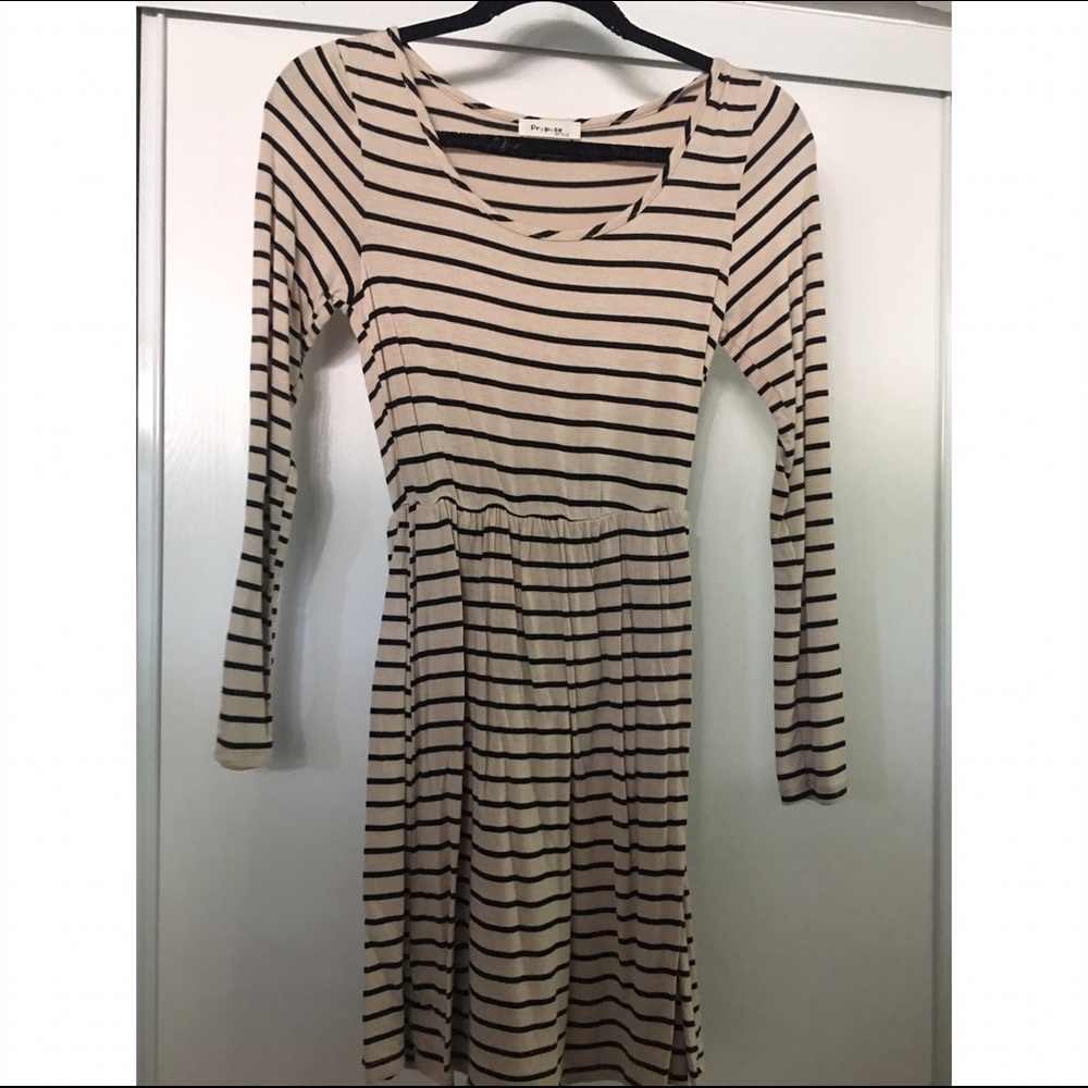 Cream colored striped. Quarter sleeve