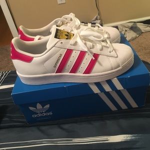 Pink and white shell toes