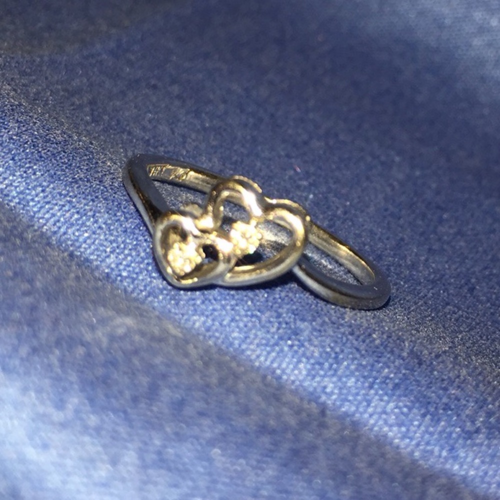 Silver and diamond ring