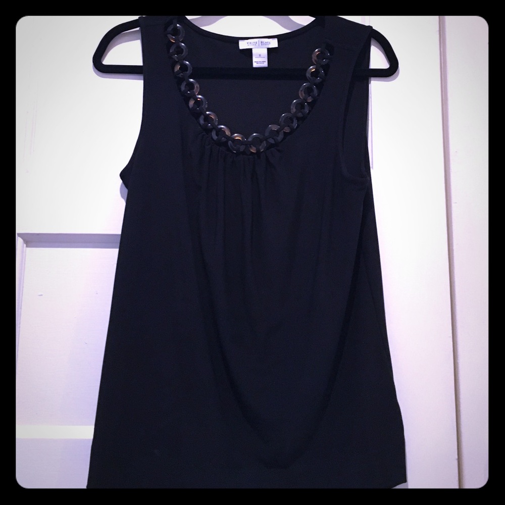 Simple and elegant top for work or play.