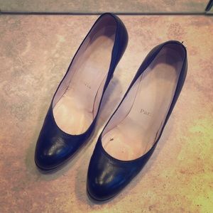 Black leather Louboutin pump
