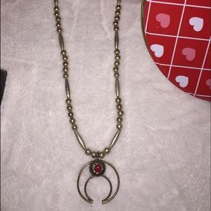 Cherokee Made crescent moon brown stone