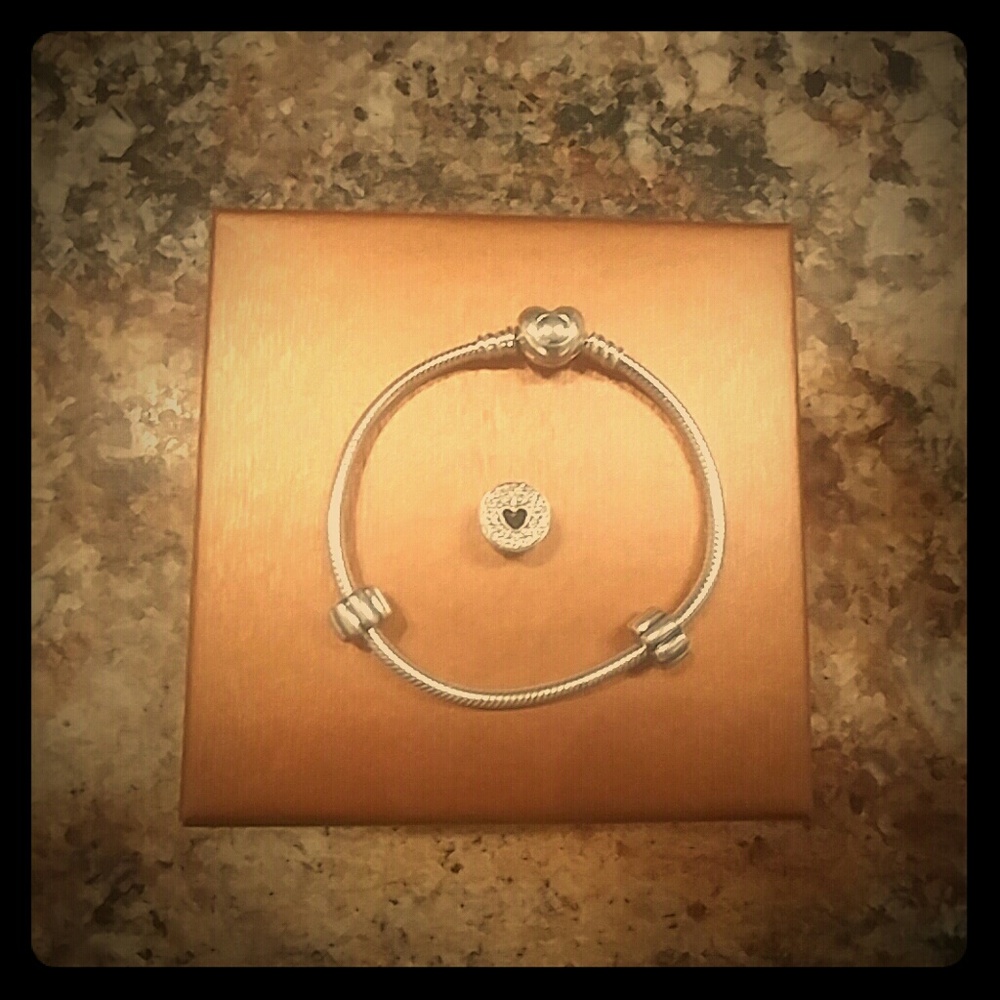 Pandora bracelet with heart charm