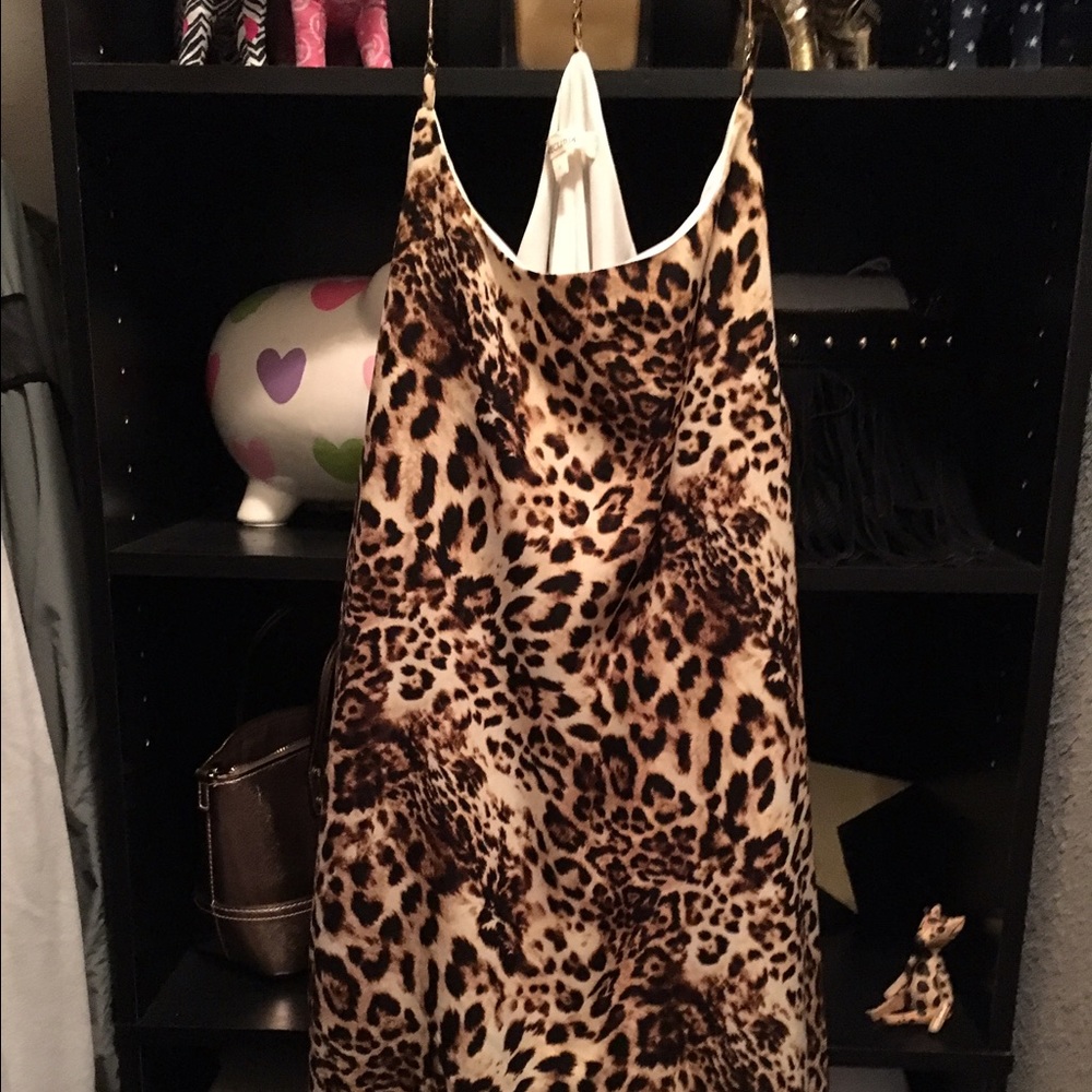 Mini Dress With chain criss cross backing.