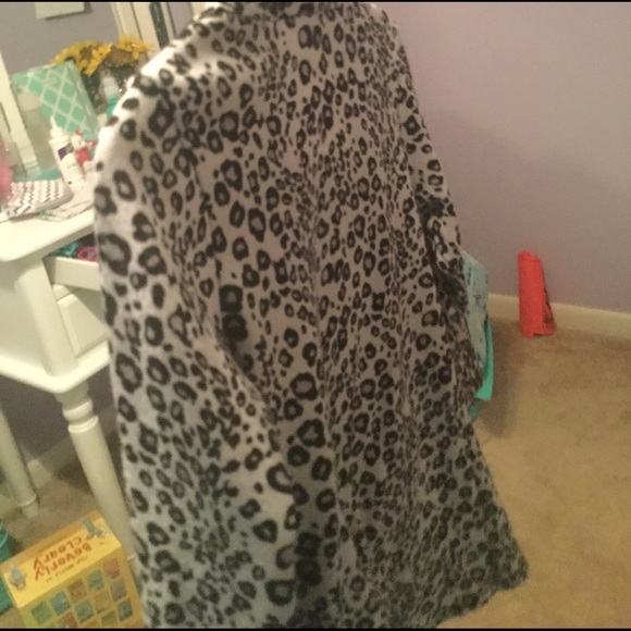 A Leopard shirt with a black tank under - Picture 2 of 3