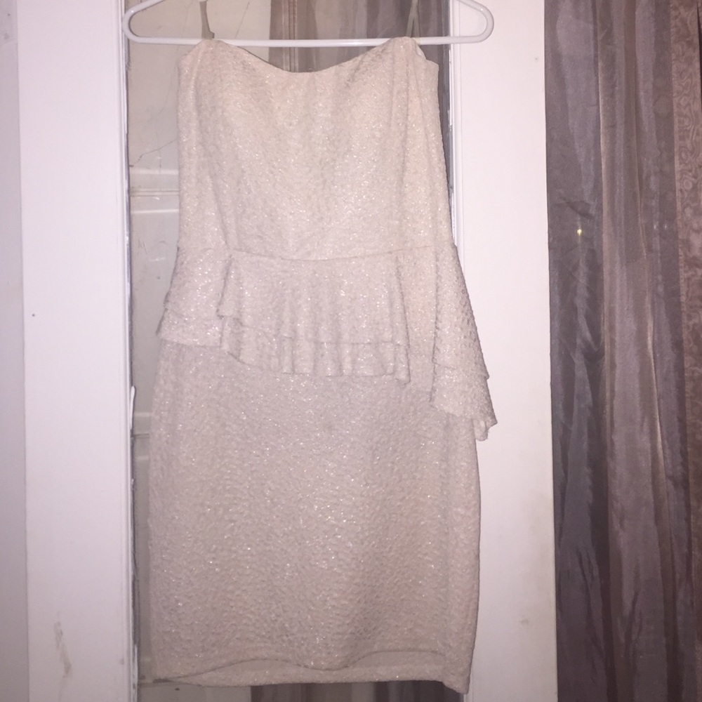 Dress with peplum